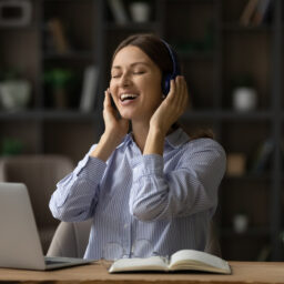 Woman listening to calming sounds in her headphones