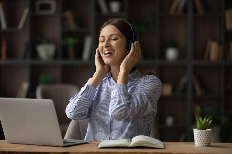 Woman listening to calming sounds in her headphones